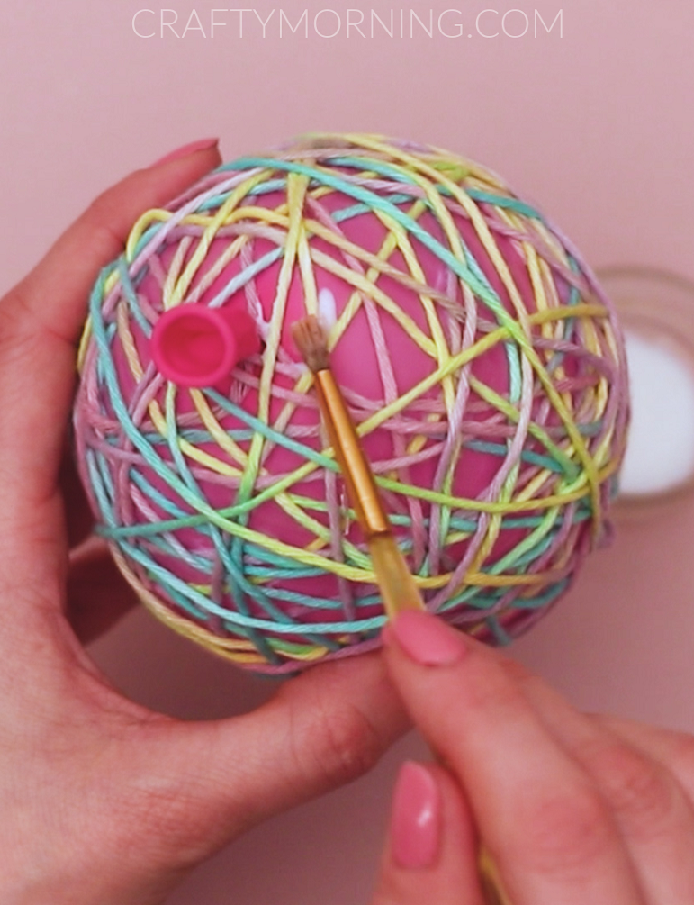 How to Make Balloon Yarn Easter Eggs - Crafty Morning
